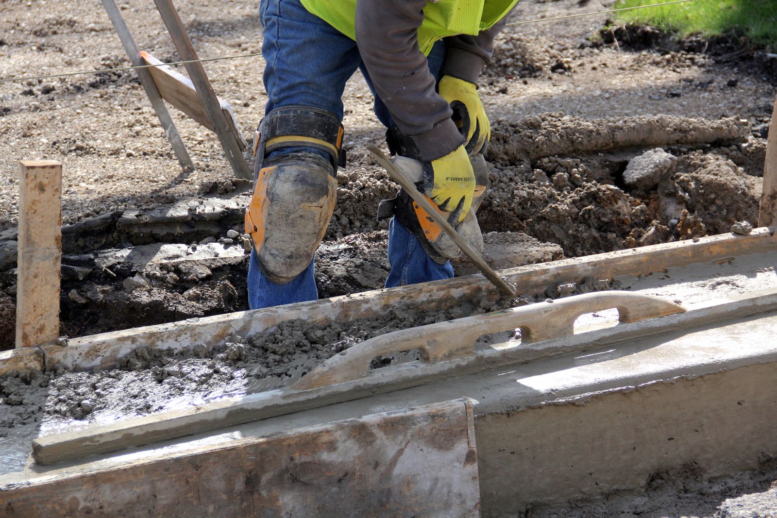 Concrete foundation forms being finished on a job site